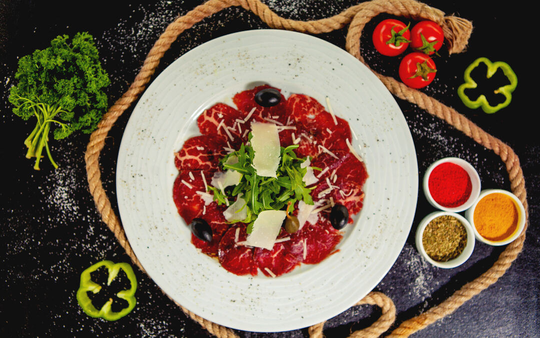 beef carpaccio with parmesan, arugula and olives